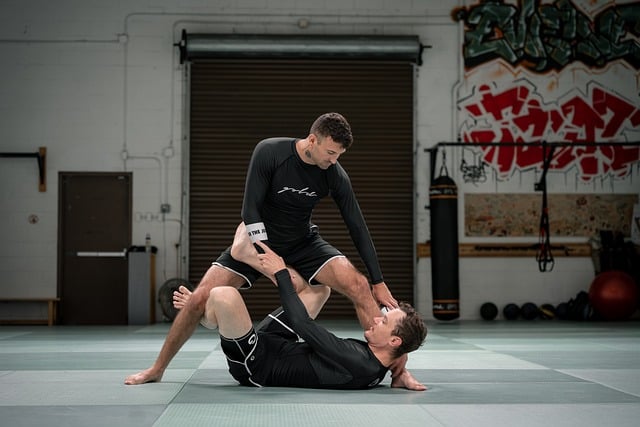 Jiu Jitsu student trying to secure a top control