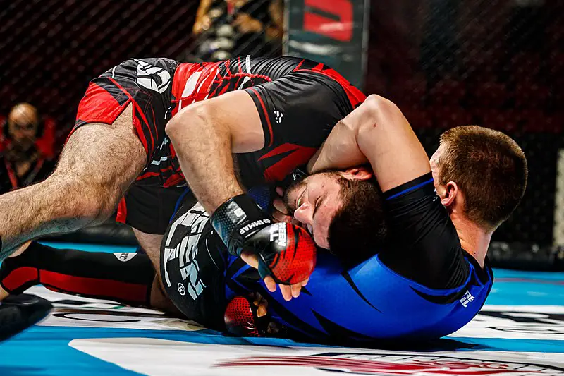 MMA fighter using a BJJ guillotine choke