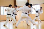 Students practicing kumite and learning karate