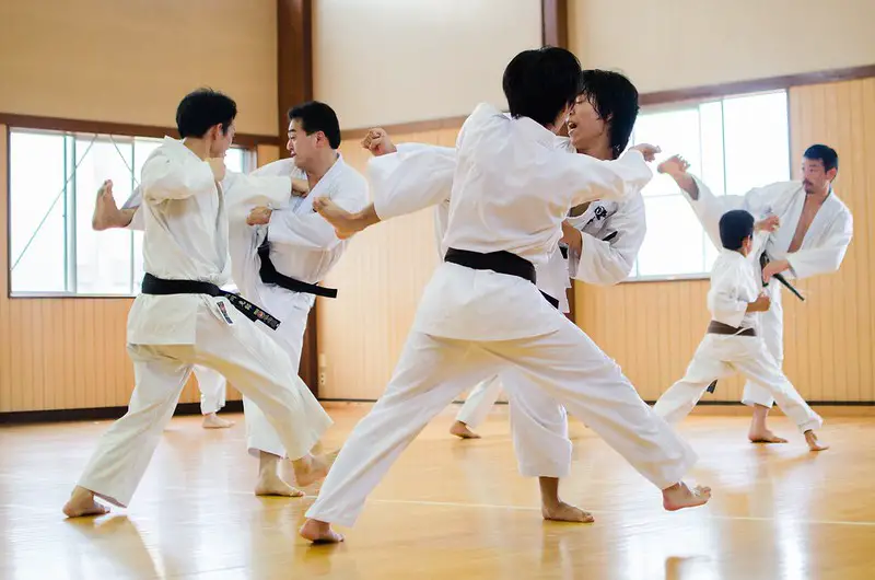 Students practicing kumite and learning karate