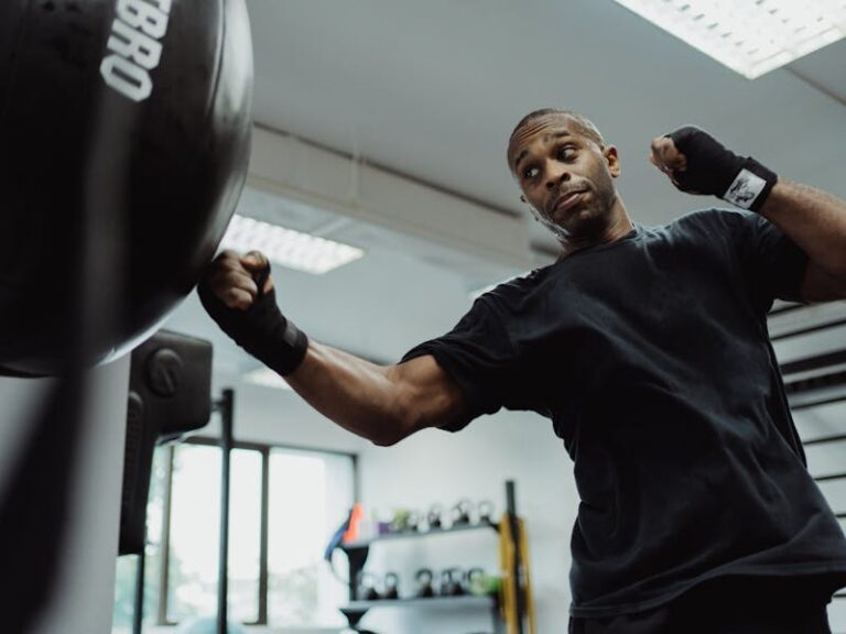 Boxing student working on the bag for improving punching power