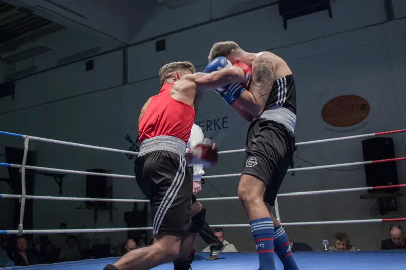 Boxer landingn a punch in a match